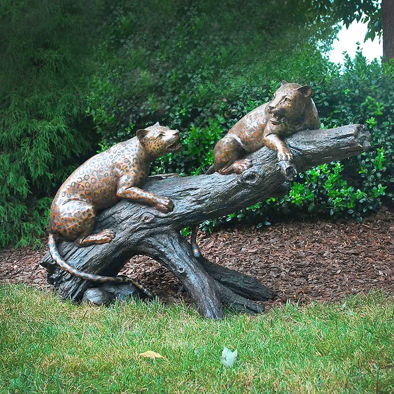 sculpture leopards on branch